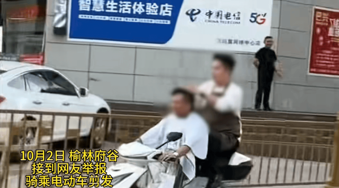 陕西一男子骑电动车时不停理发<strong></p>
<p>币安下载链接</strong>,被罚款500元、驾驶证记9分;民警呼吁公众注意电动车出行安全